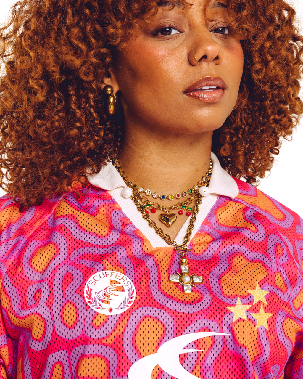 Kaleidoscope gold necklace stack worn by model — three layered bold gold necklaces by STXCKD