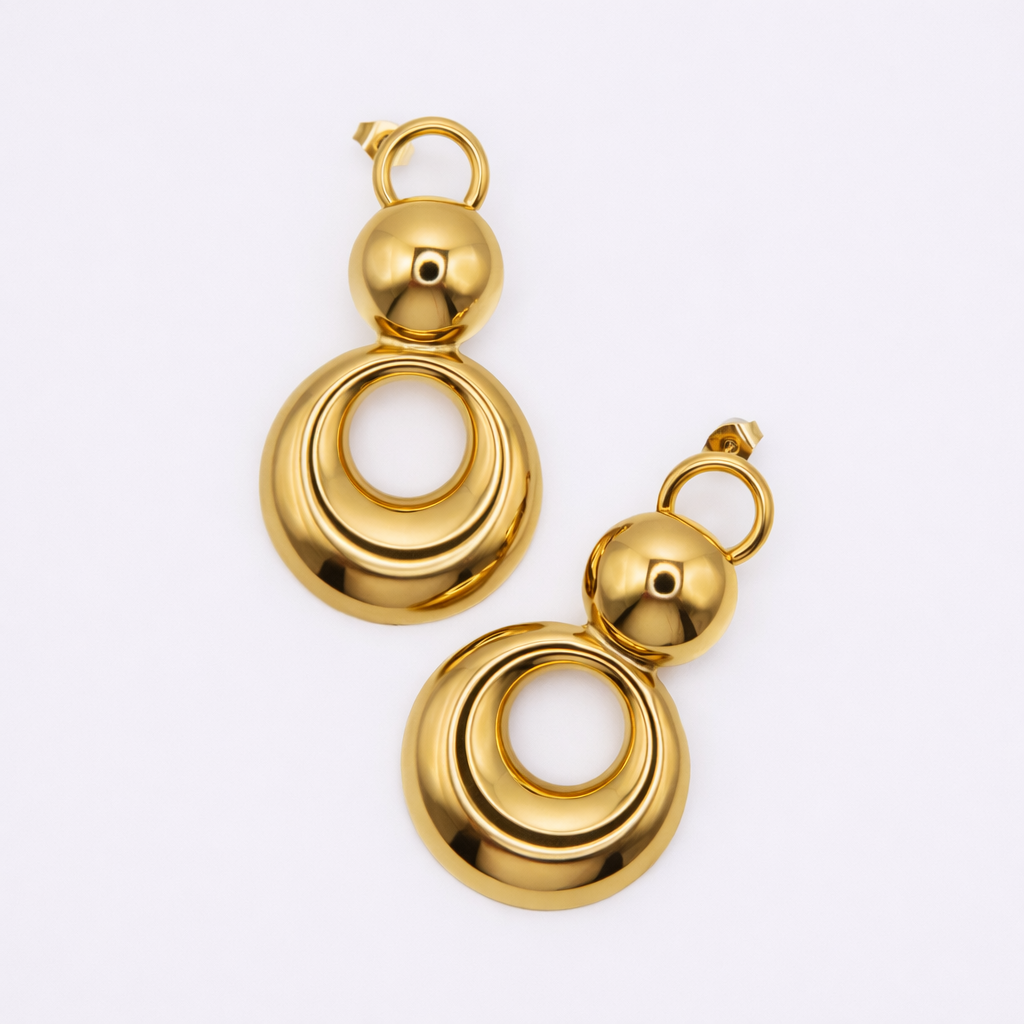 Orbit gold drop earrings — architectural bold statement earrings by STXCKD